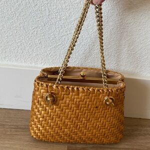 Mid-century Italian-made woven rattan purse, sold by I. Magnin, 1960s.